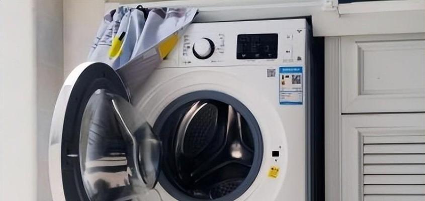 解决洗衣机洗完衣服有臭味的方法（消除洗衣机内残留异味）